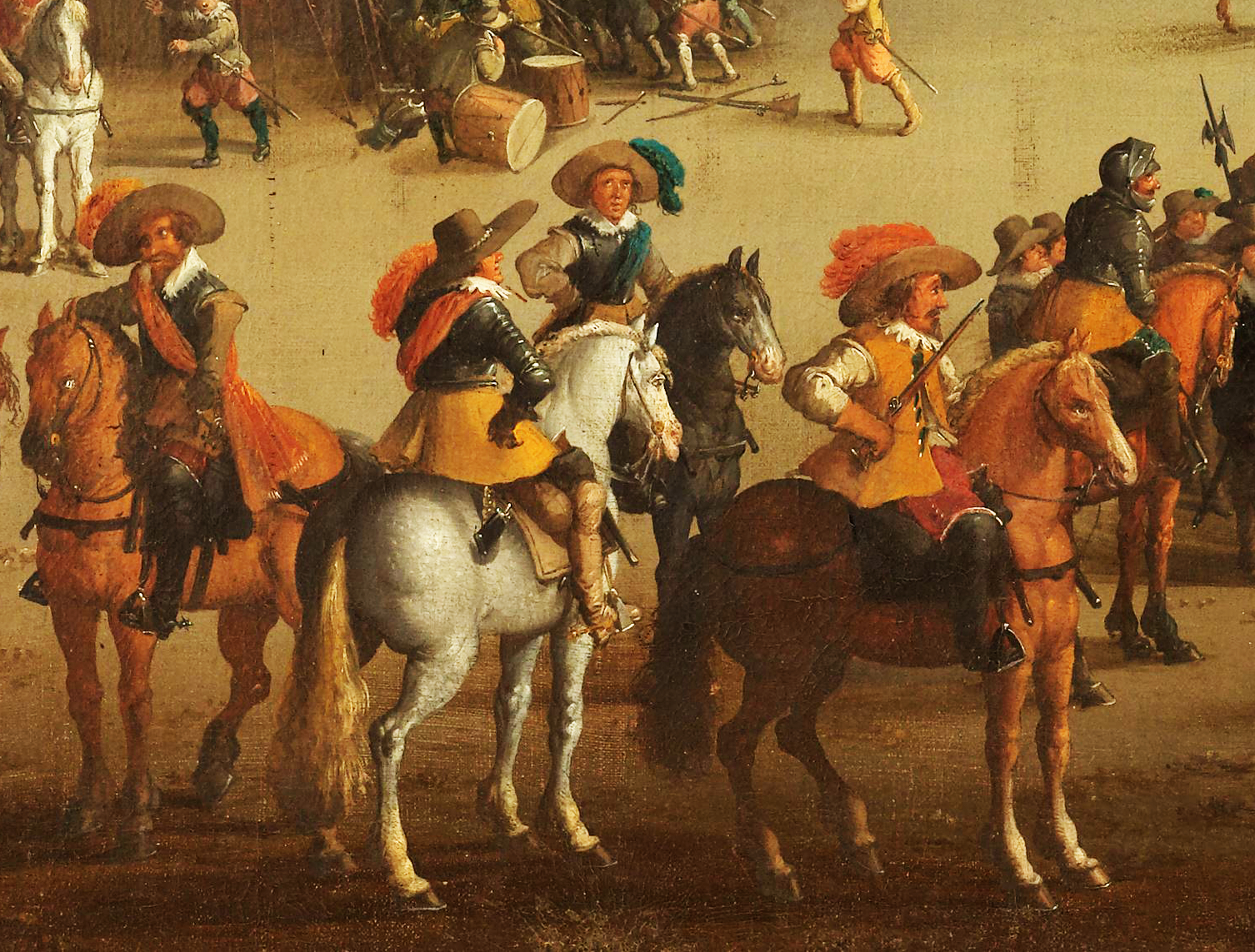 Scene where several men are on horses